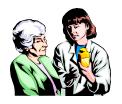 Picture of nurse explaining medication to elderly woman.