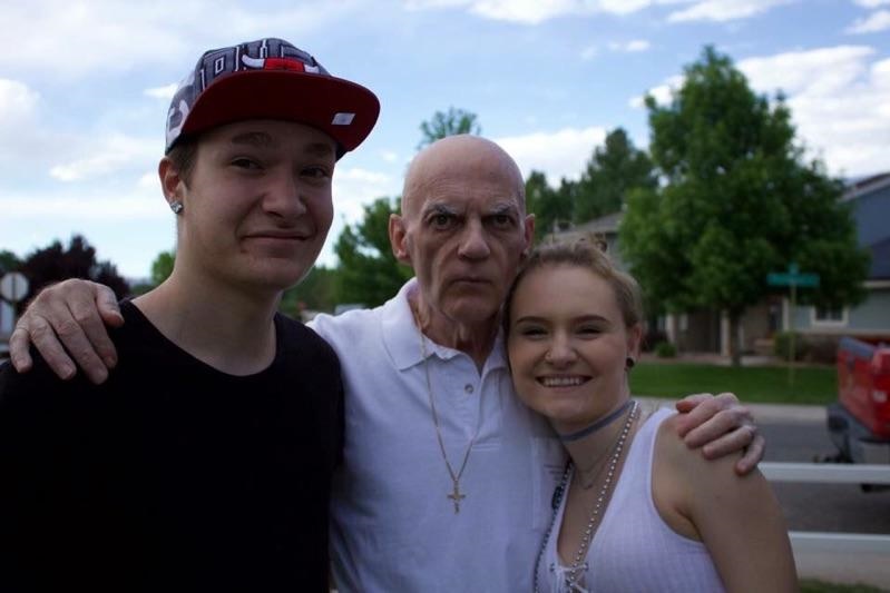 Photo of T. Burke's husband and grandchildren.